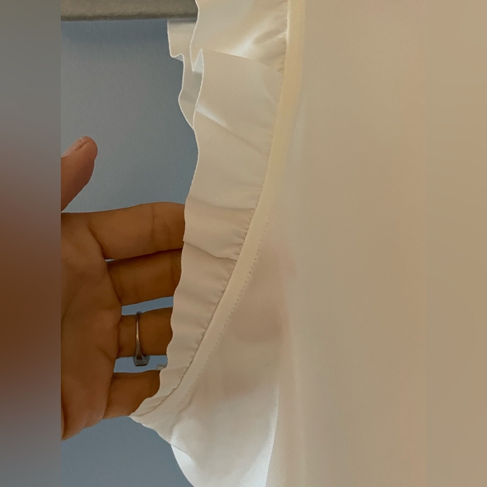 TNUCK SPORT
White Ruffle Lea Tank - Picture 2 of 8